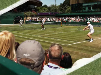 11 55 P H Herbert J Thompson H Heliovaara H Patten tennis